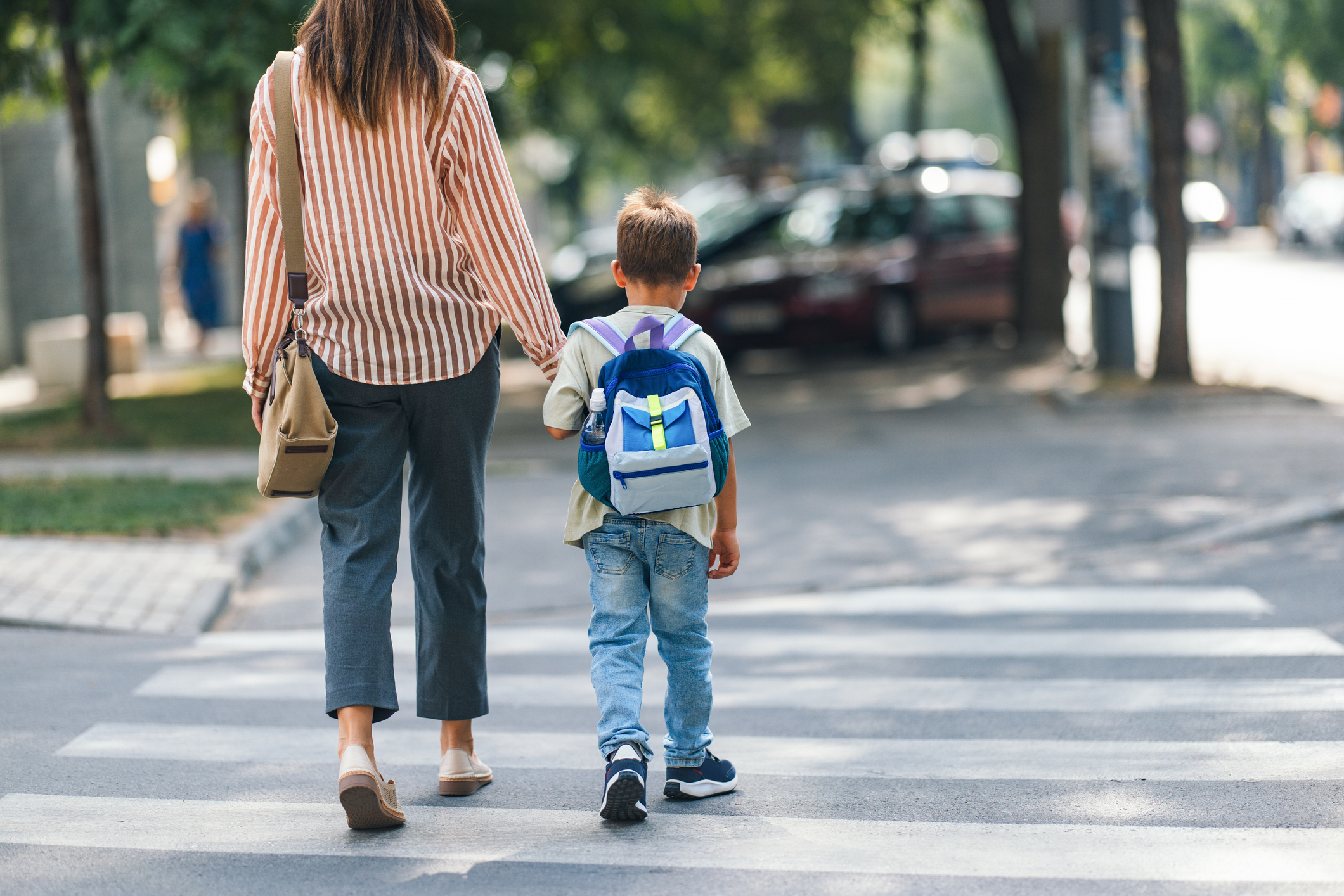 Mother Walking Child to School